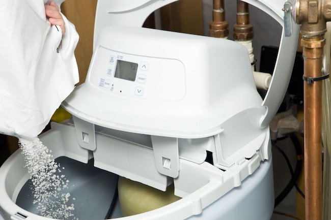 Refilling water softener unit in home